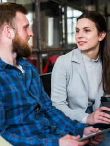 young-female-workers-having-conversation-break